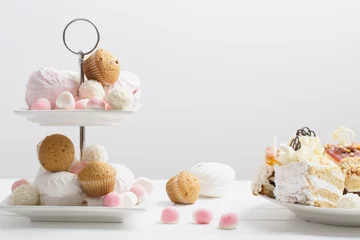 Deurstickers dessert on white table © Maya Kruchancova