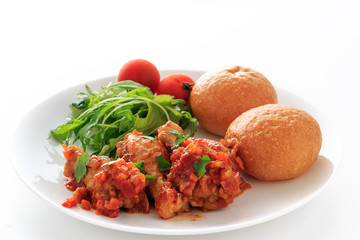 chicken  ragu with tomato sauce on the white background