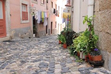 Fototapeta na wymiar Small street in Alfama, Lisbon