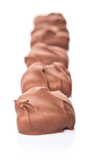Toffee candy over white background