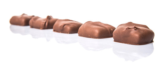 Toffee candy over white background