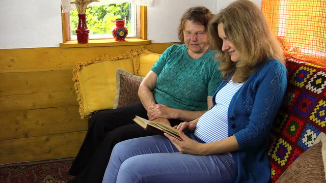 Happy family women have fun reading book