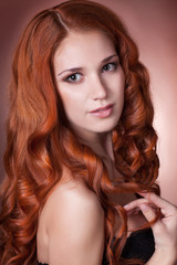 Naklejka premium Beauty woman face red hair girl studio
