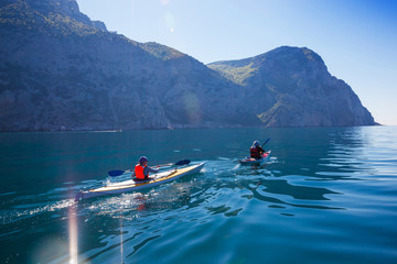 Kayak. People kayaking in the sea. Activities on the water.