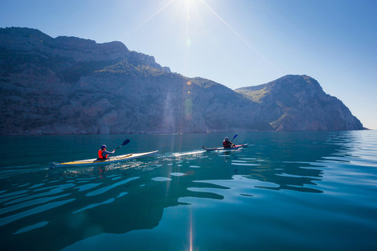 Kayak. People kayaking in the sea. Activities on the water.