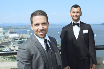 loving gay male couple on their wedding day.