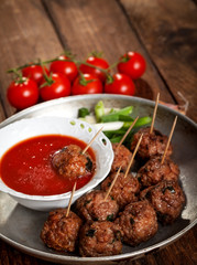 Meatballs with tomato souce and cherry tomato