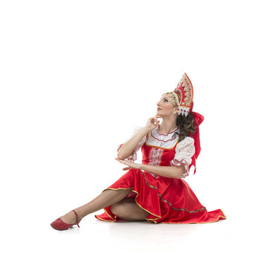 Woman In National Russian Dress Sitting Looking Left Top