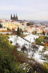 Fototapeta na wymiar First Snow in Prague City with gothic Castle, Czech Republic