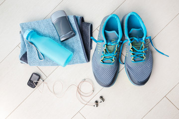 Pair of sport shoes and fitness accessories. Fitness concept