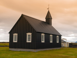 Fototapeta na wymiar Black wooden church