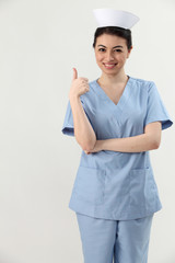nurse with thumb's up