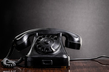 Old black telephone retro 1970s style with Copy-space