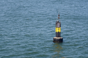 autonomous buoy with solar panels on  water