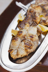 Grilled tuna fish on silver plate