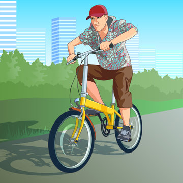 young man riding a yellow bike