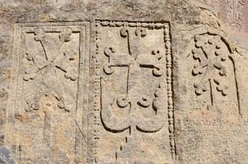 Stone khachkars (crosses) and ancient armenian inscriptions