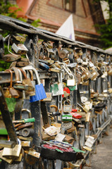 Locks on a bridge railing