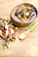 Thai stew of pork and herbal soup,
