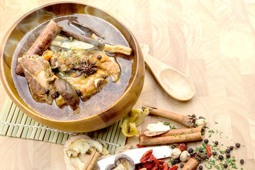 Thai stew of pork and herbal soup,