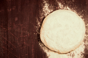fresh the dough is ready for baking on wooden background