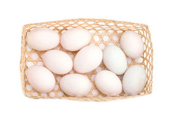White eggs in basket