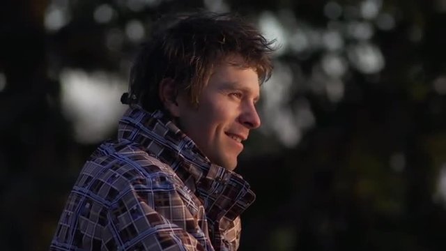 Portrait Shot Of Young Sportsman Enjoying Fresh Air Outdoors In Nature