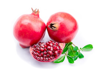 Ripe pomegranates with leaves