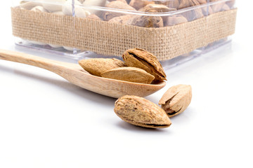 Assorted nuts in wooden spoon
