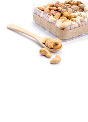 Assorted nuts in wooden spoon