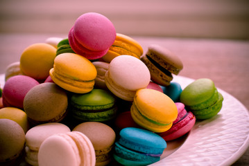 Fototapeta na wymiar traditional french colorful macarons, background