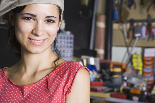 Middle Eastern woman in home workshop