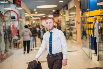 young businessman in a shopping center