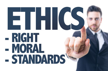 Business man pointing the text: Ethics
