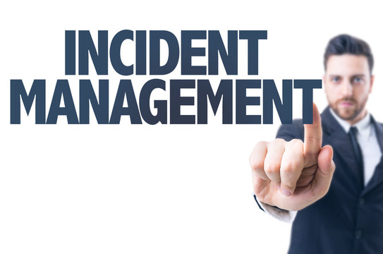 Business man pointing the text: Incident Management