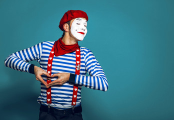 mime in red beret smiles