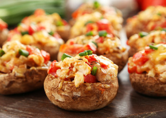 Stuffed mushrooms on cutting board