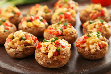 Stuffed mushrooms on cutting board