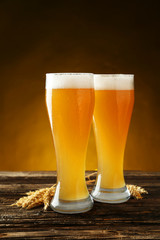 Milk cocktail with banana, blackcurrant and raspberry in a glass