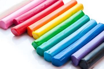 Rainbow colors plasticine play dough modeling clay isolated over