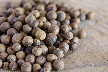 Allspice on an old wooden table