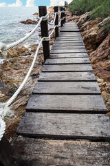 Fototapeta premium Wood bridge the sea.