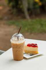 Ice coffee and strawberry Cake