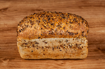 fresh bread on the brown wooden table