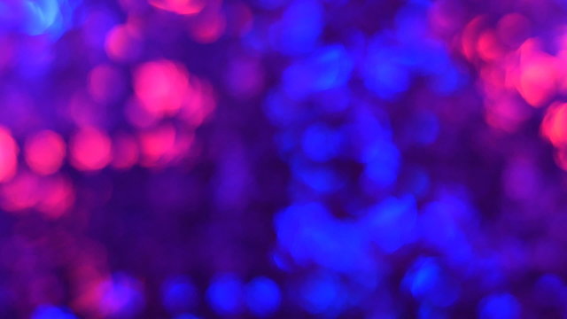 Multi colored light in motion. Abstract blurred light reflection