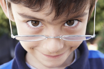 Hispanic boy wearing eyeglasses