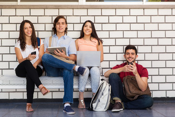 Group of students using technology at school