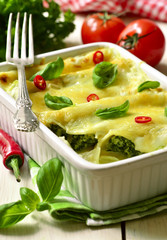 Cannelloni - baked pasta stuffed with spinach,chicken and cheese