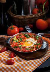 Shakshuka with tomatoes and eggs