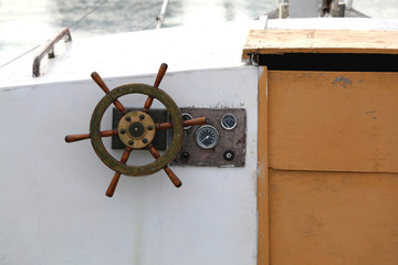 Vintage looking rudder on a boat, boat detail. © jelena990